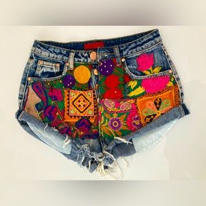 High-Waist Distressed Denim Booty Shorts with Handmade Quilted Details